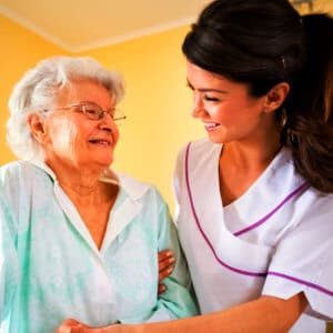 elder woman with caregiver