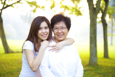 a woman and an elderly smiling