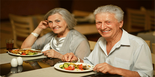 a couple eating at a restaurant