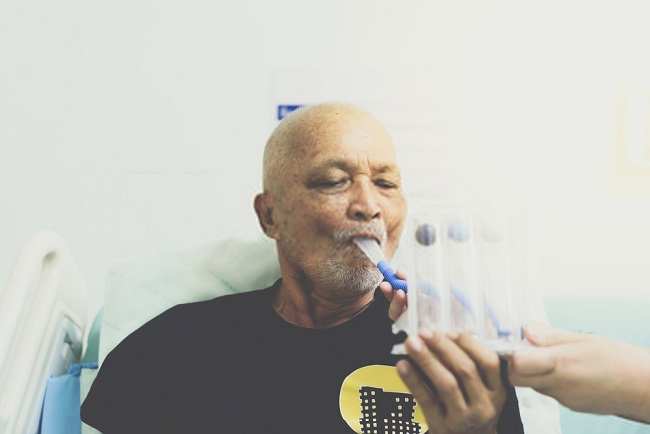 a man testing his lung strength
